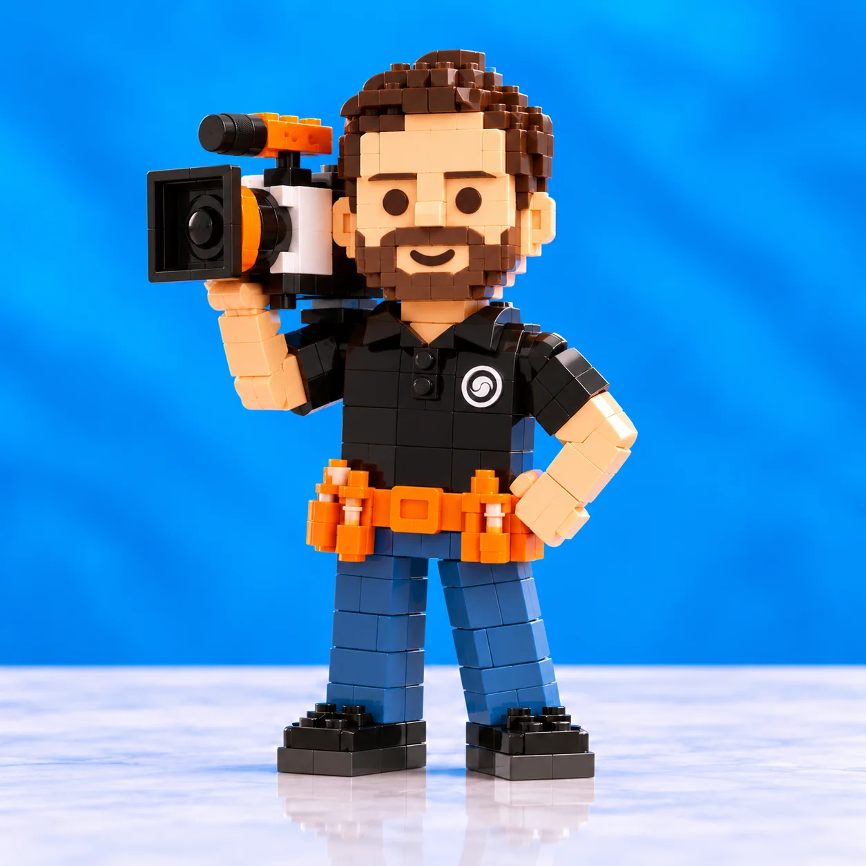 Dan Daymude as a brick-built character with a cinema camera