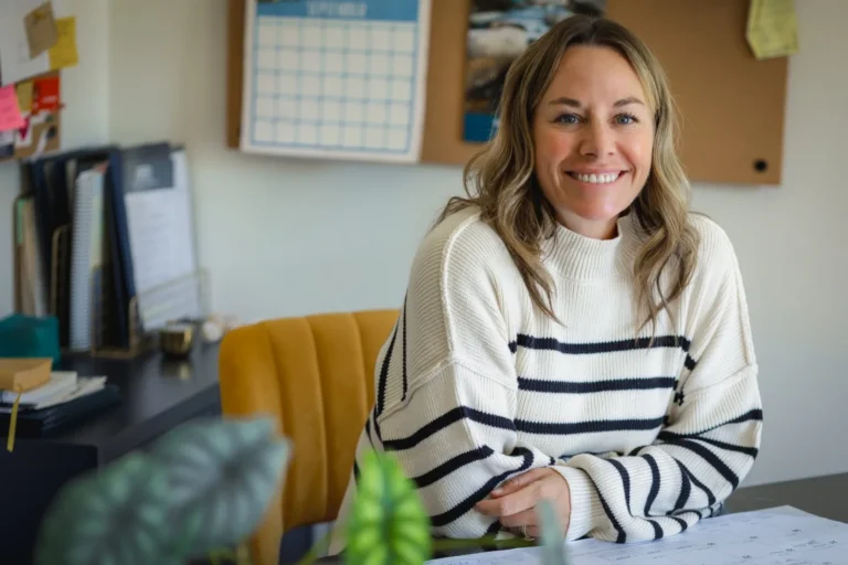 Cassandra Sandmeyer at her desk